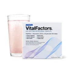 A box of VitalFactors, 40 effervescent tablets, beside a glass of the pink sparkling drink